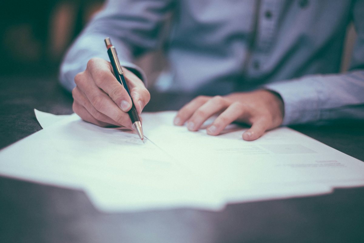 Client signing a contract